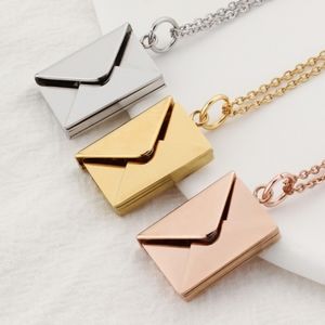 Tiny envelope locket